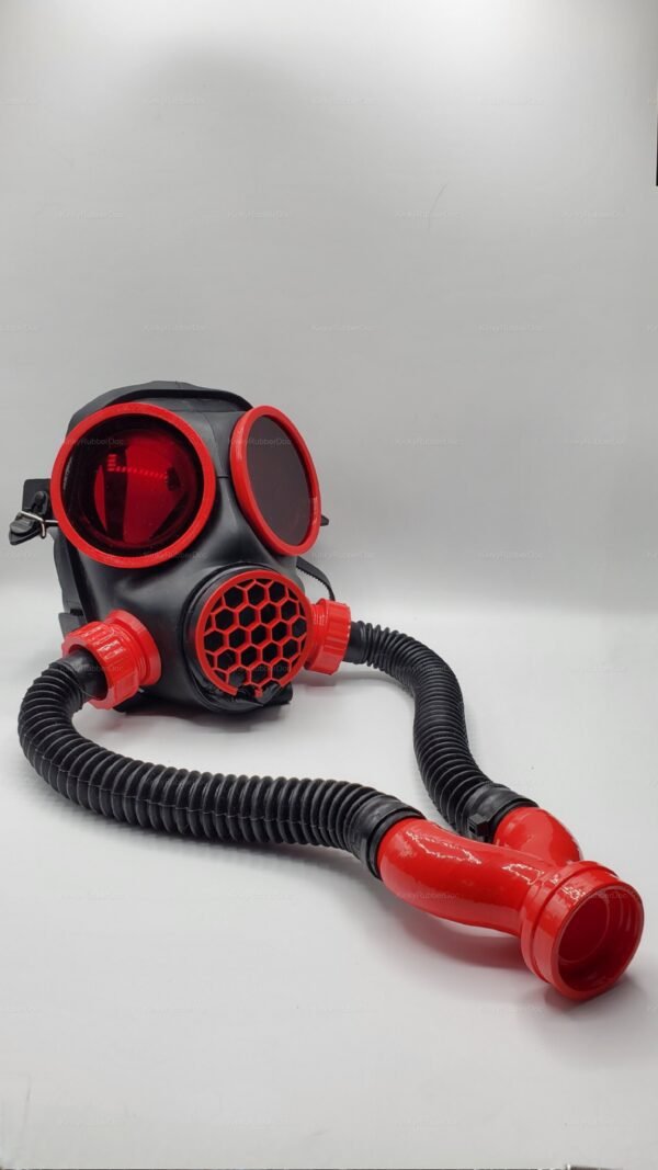 Black and red gas mask with flexible hoses and a honeycomb grill for a bold, edgy look.