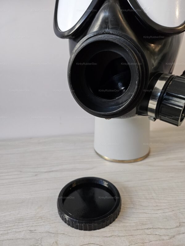 A sleek black gas mask with a detachable front block lid valve, designed for a bold and edgy look.
