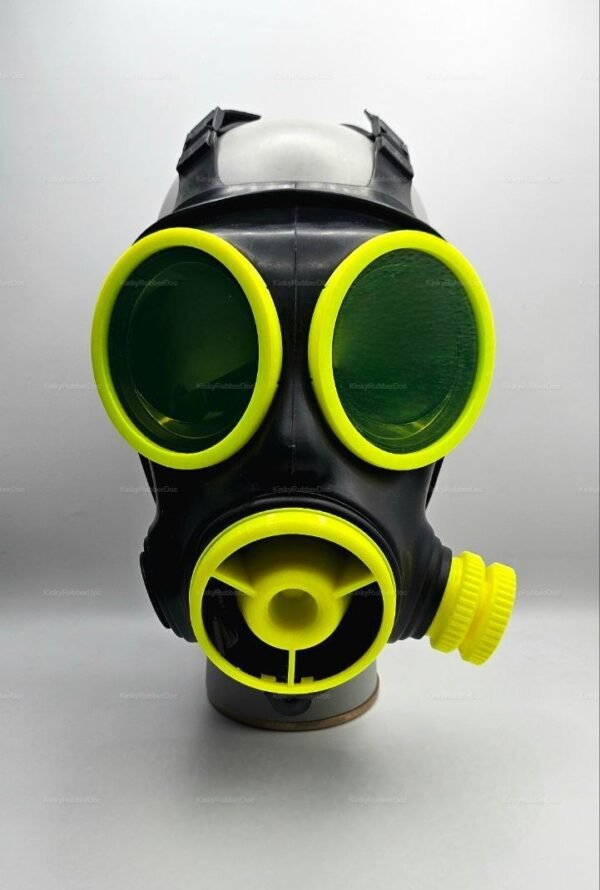 A striking black and neon yellow gas mask with a bold, industrial design, featuring large circular lenses and a front radiator lens.