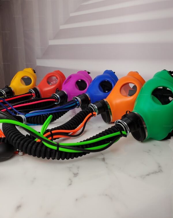 A collection of vibrant, colorful gas masks featuring flexible hoses and scent bulbs, designed for the fetish community.