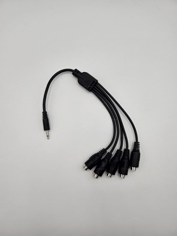 A black kink-cable-splitter-estim-multiport with multiple connectors for versatile connections.