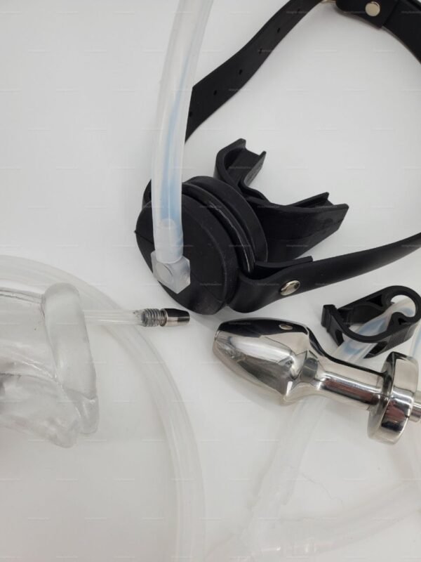 A comprehensive kink-hose-circuit-anal-gag-catheter-toy with sleek metal and flexible silicone components.