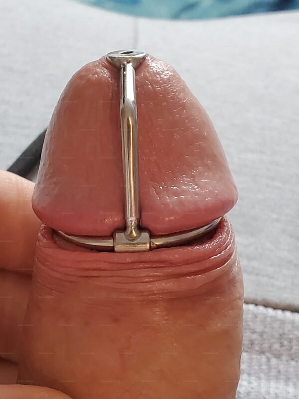 Stainless steel kinkyrubberdoc urethral hook enhancing intimate exploration.