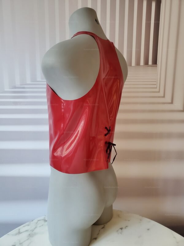 Red latex vest with back lacing detail, featuring a shiny finish.