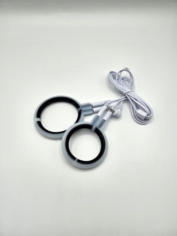 Shock Cock Ring with dual rings and connecting wires on a white background.