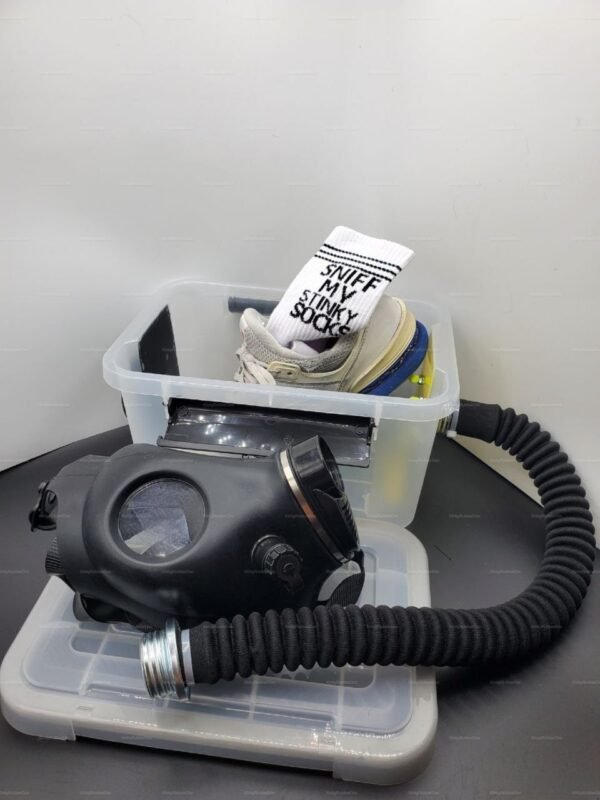 Large sniff box with hose and gas mask for fetish scent roleplay.