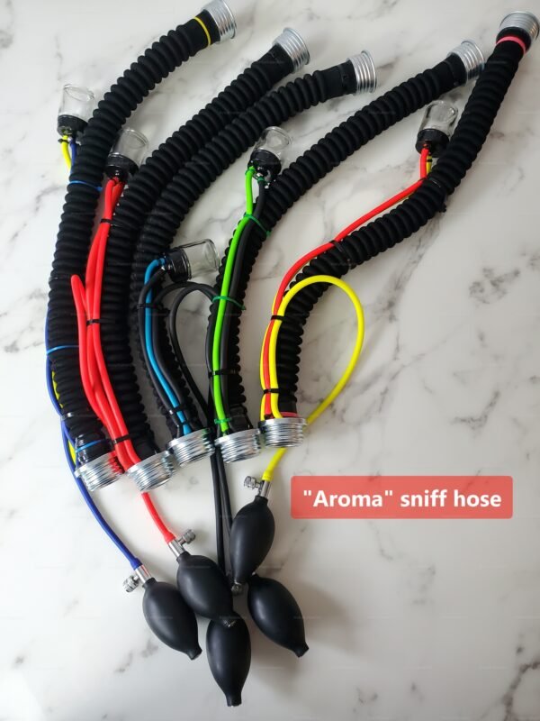 A collection of colorful sniffing hoses with RD40 gas mask connectors designed for poppers and scent play.