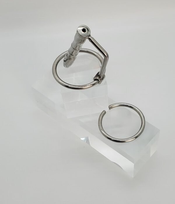 A sleek metal sounding plug with a glans connector, featuring a polished finish and ergonomic design.