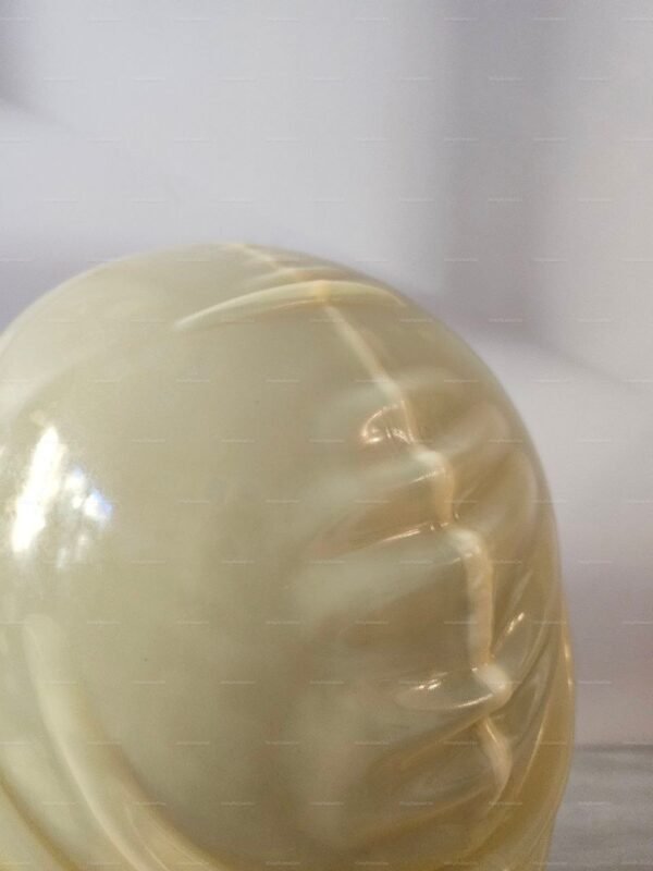 A smooth, transparent latex fetish hood without a zipper, showcasing its glossy texture and seamless design.
